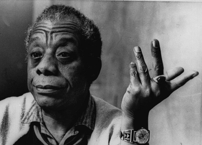 Black and white photo of James Baldwin