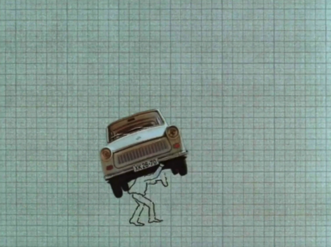 still from hand-drawn animation depicting a man drawn simply with just black outlines carrying a cut-out of a car across the graph-paper background