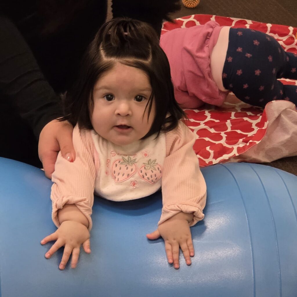 Child and parent playing during storytime