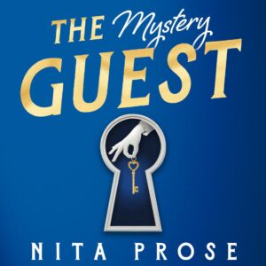 Book cover for "The Mystery Guest" by Nita Prose featuring a large keyhole with a hand holding a key, set against a blue background with gold and white text.