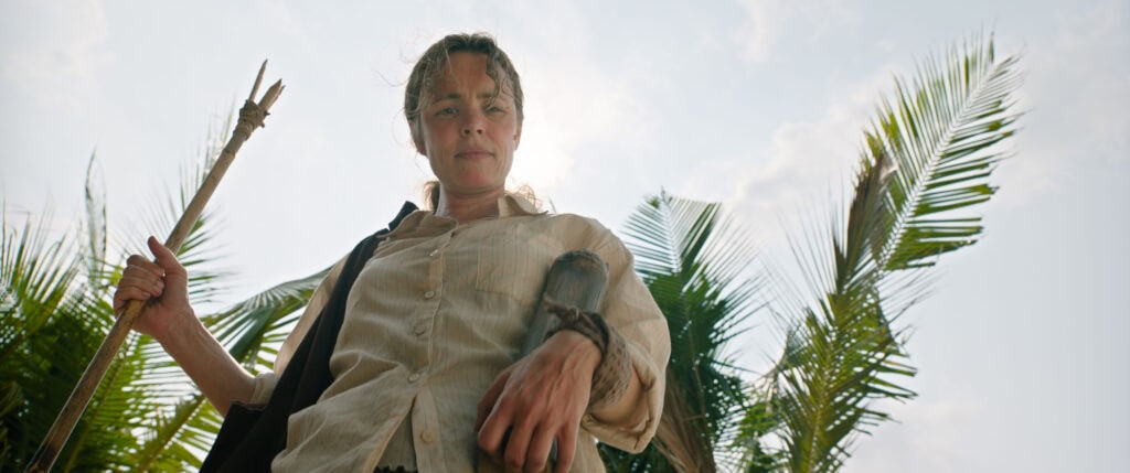Rachel McAdams holding a spear